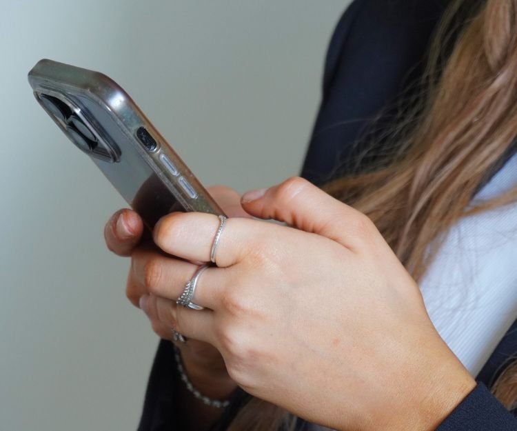 Woman checking a message on her phone