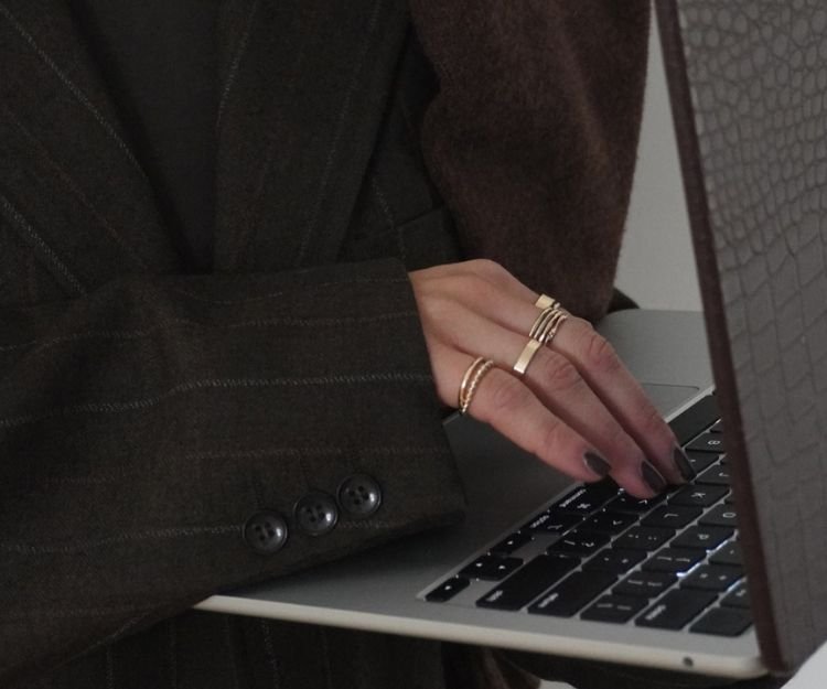 Close-up of a woman working on a laptop