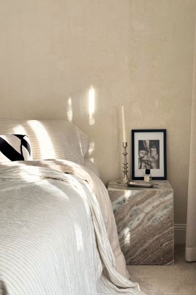 Collage of three images: sunlight casting patterns across white bedroom linen