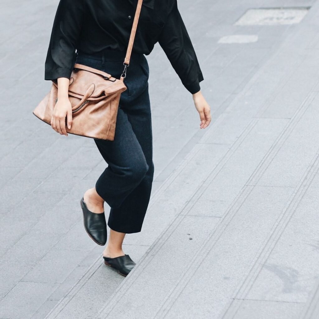 Confident woman walking representing motivation and personal development